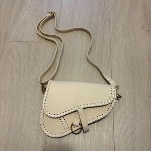 Elegant Cream Crossbody Saddle Bag